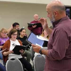 Artistic Director Brian Dehn leading a rehearsal.