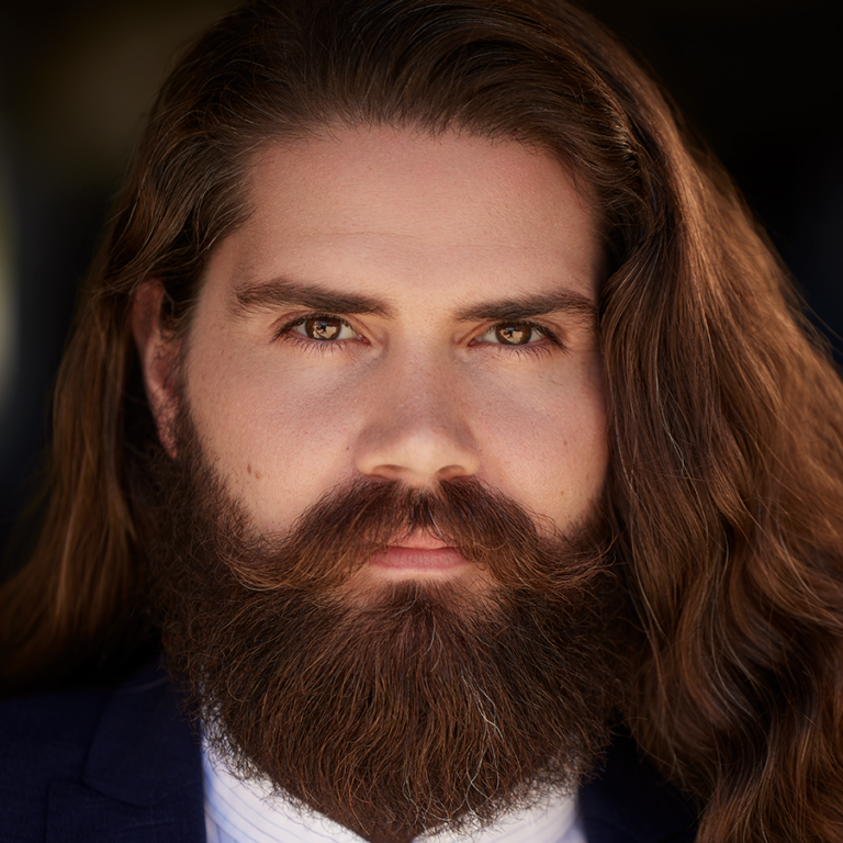Headshot portraint of singer Arnold Geis, Tenor.