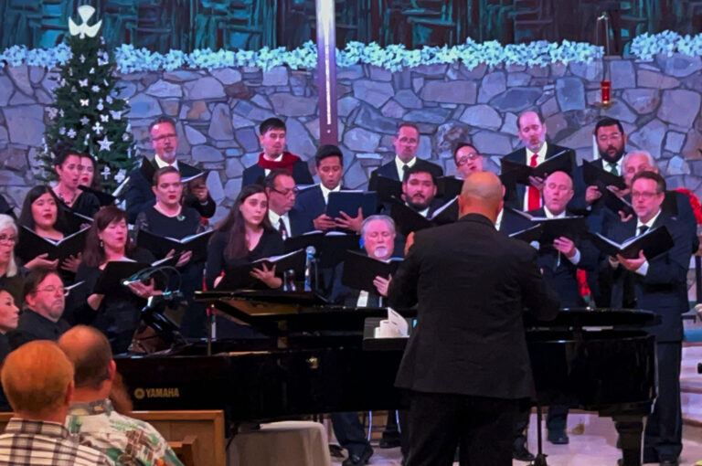 Dr. Brian Dehn conducts the choir during A Southern California Christmas.
