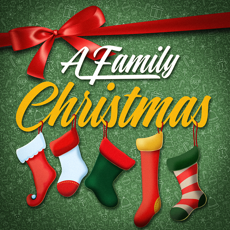 The words A Family Christmas on a green background with Christimas stockings hung from the letters.